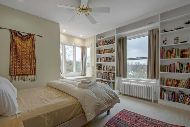 bedroom with recessed lighting, a ceiling fan, radiator, and carpet floors