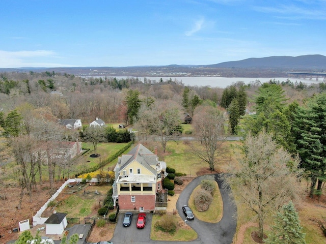 aerial view featuring a water and mountain view