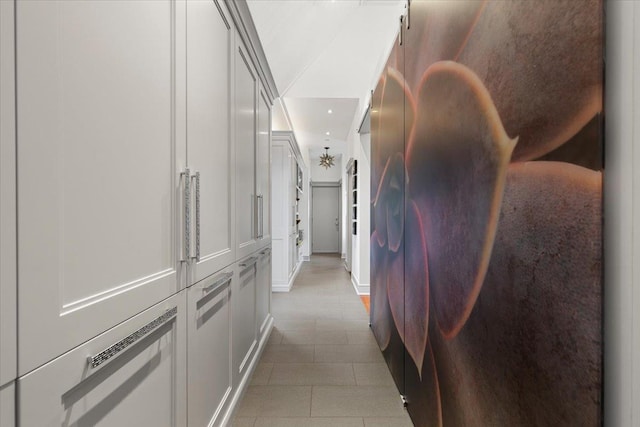 hallway featuring light tile patterned flooring