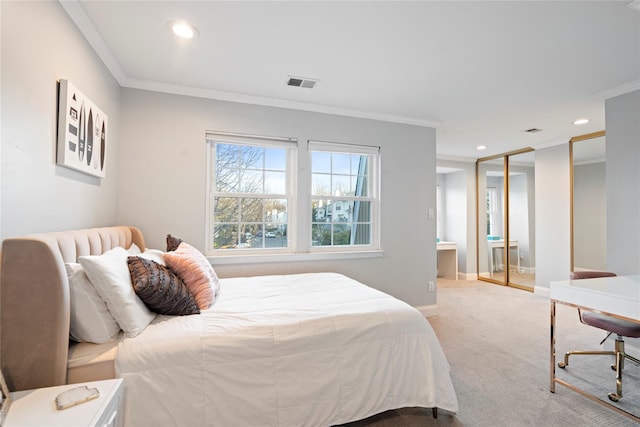 carpeted bedroom with baseboards, visible vents, crown molding, and recessed lighting