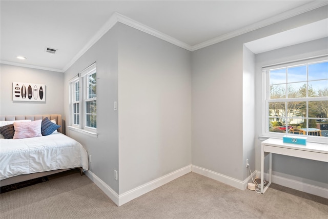 bedroom featuring crown molding, carpet floors, visible vents, and baseboards