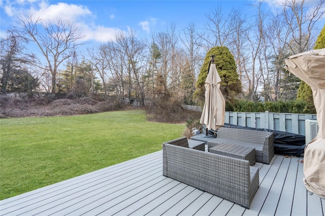 wooden terrace with a yard and cooling unit