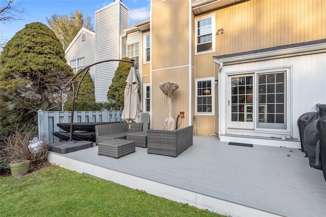 view of patio / terrace featuring a wooden deck and an outdoor hangout area