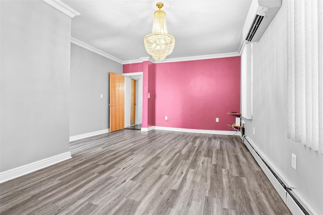 empty room with a notable chandelier, crown molding, baseboard heating, and a wall mounted AC