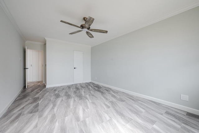 unfurnished bedroom featuring ornamental molding, ceiling fan, and baseboards