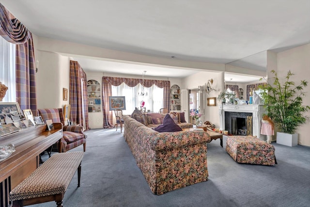 living room with a premium fireplace and carpet flooring