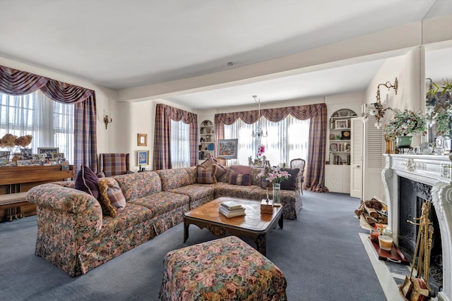 carpeted living room featuring a high end fireplace