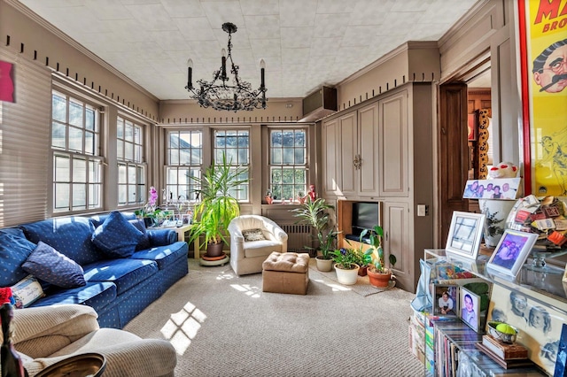 sunroom / solarium with a notable chandelier