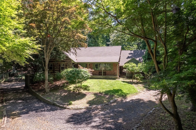 35 Mary Pitkin Path, Shoreham, NY 11786 - view of front facade with roof with shingles and a front lawn