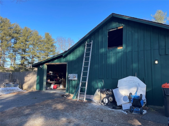 garage with fence