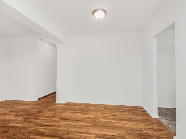 empty room featuring wood finished floors