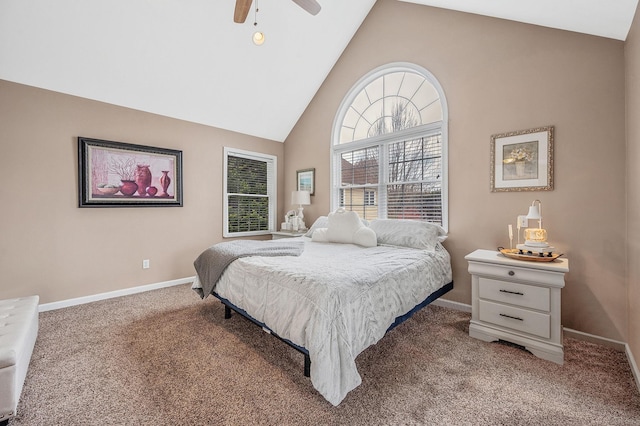 bedroom with ceiling fan, high vaulted ceiling, carpet flooring, and baseboards