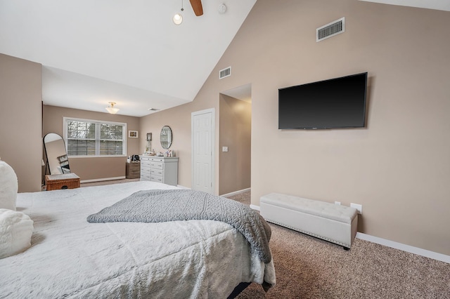 carpeted bedroom with high vaulted ceiling, baseboards, and visible vents