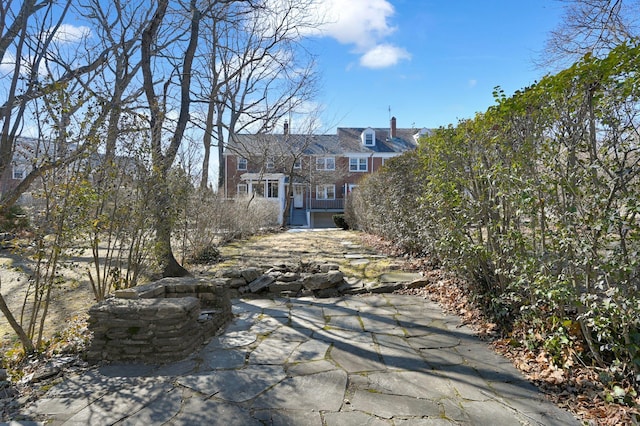 exterior space featuring a chimney