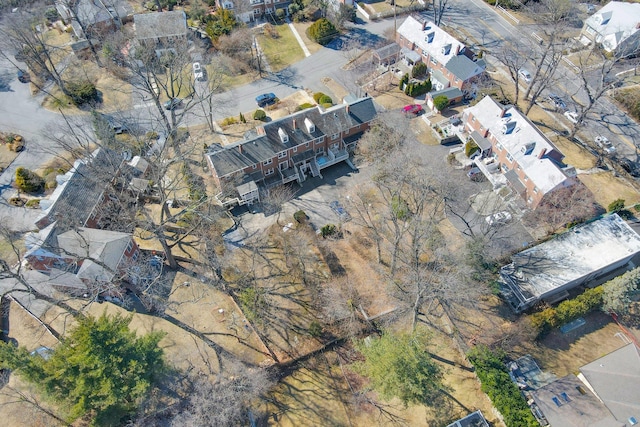 birds eye view of property with a residential view