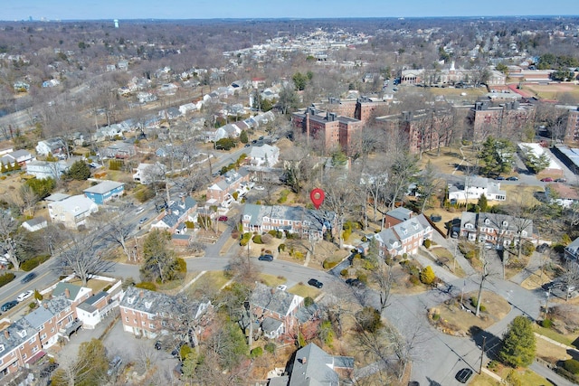 birds eye view of property with a residential view