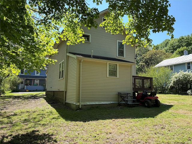 16 Fair St, Highland, NY 12528 - back of property featuring a lawn