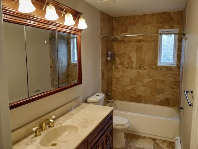 full bath featuring toilet, a baseboard heating unit, shower / washtub combination, and vanity