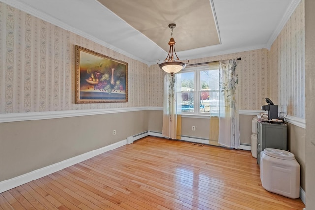 interior space featuring a baseboard radiator, hardwood / wood-style flooring, baseboards, ornamental molding, and wallpapered walls