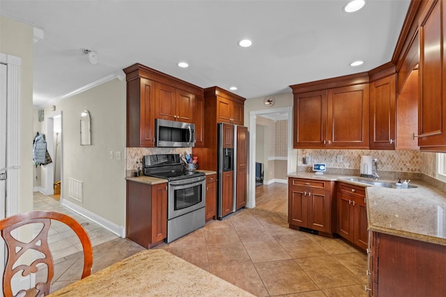 kitchen featuring light tile patterned floors, tasteful backsplash, ornamental molding, and stainless steel appliances