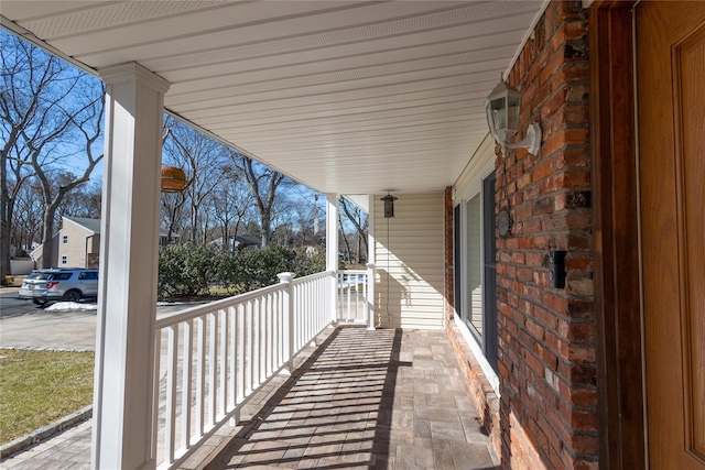 balcony featuring a porch