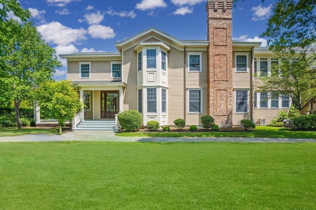 view of front of property with a front lawn