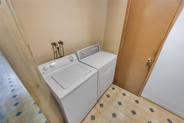 laundry area featuring laundry area and washing machine and dryer