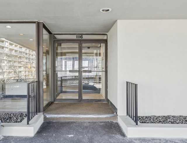 doorway to property featuring french doors