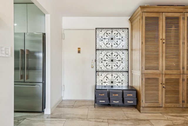 interior space featuring freestanding refrigerator