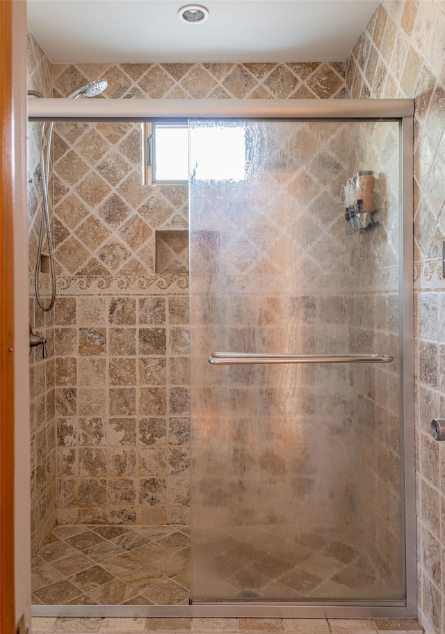 full bathroom with a stall shower