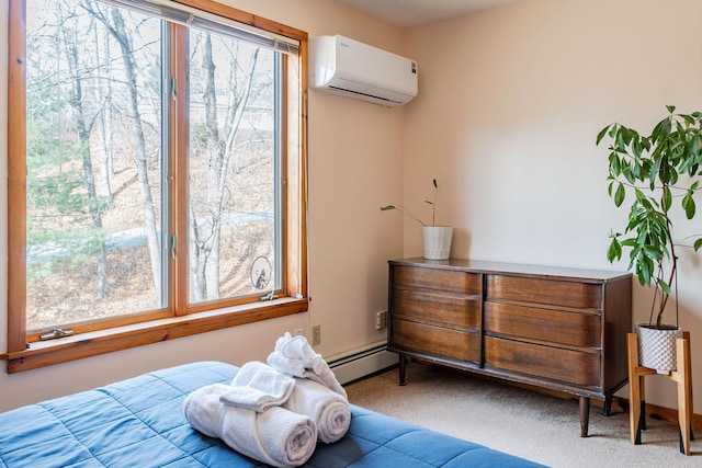 bedroom featuring baseboard heating, a wall unit AC, and carpet floors