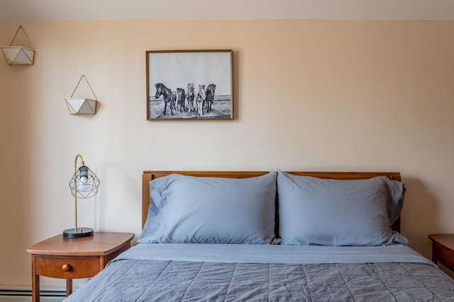 bedroom featuring a baseboard radiator