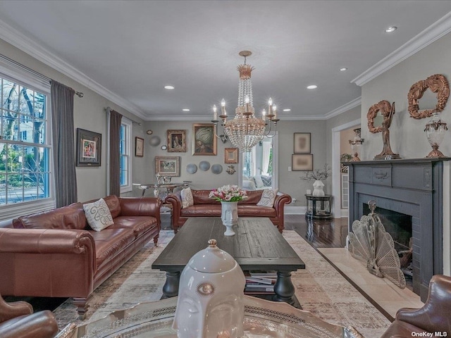 living room featuring a fireplace with flush hearth, a wealth of natural light, light wood-style floors, and crown molding