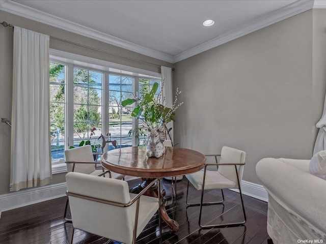 dining space featuring ornamental molding, recessed lighting, baseboards, and dark wood-style floors