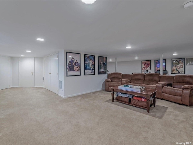 living room featuring visible vents, carpet flooring, and recessed lighting