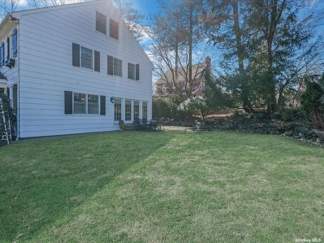 exterior space featuring a lawn