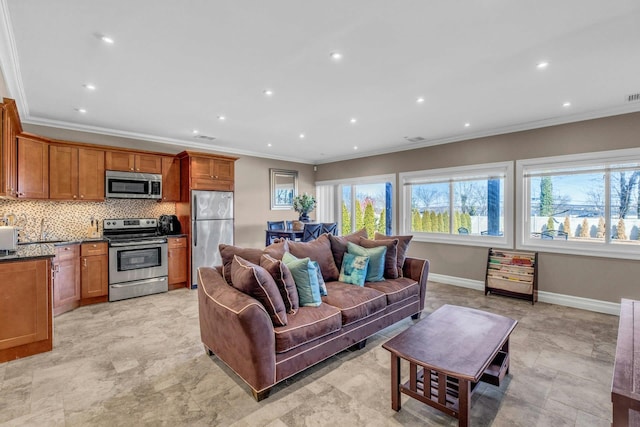 living room featuring recessed lighting, visible vents, crown molding, and baseboards