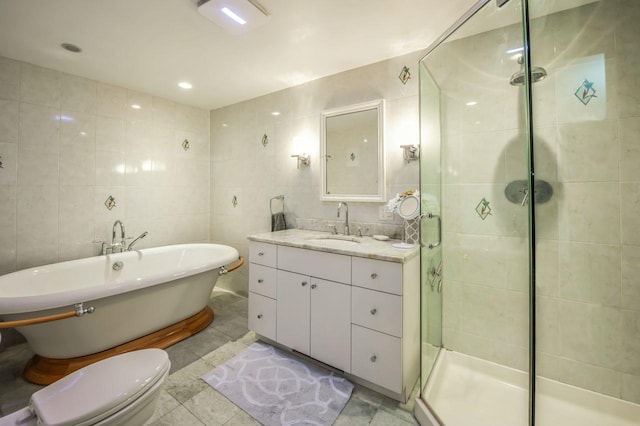 full bathroom with toilet, a stall shower, tile walls, a soaking tub, and vanity