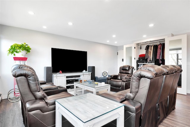 living room featuring wood finished floors and recessed lighting