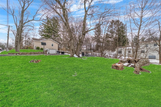 view of yard with a garage