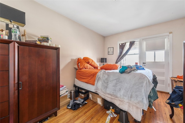 bedroom featuring wood finished floors