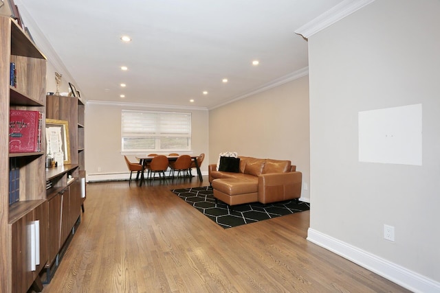 living area with ornamental molding, recessed lighting, baseboards, and wood finished floors