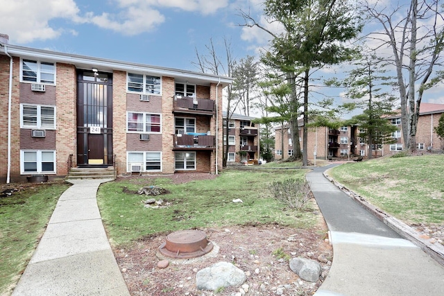 view of building exterior with a fire pit