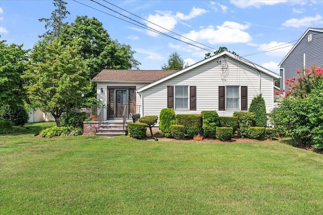 view of front of house with a front lawn