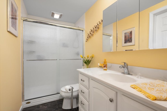 full bathroom featuring toilet, a stall shower, tile patterned floors, and vanity