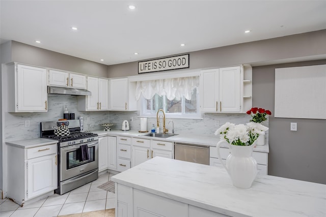 kitchen with open shelves, stainless steel appliances, white cabinets, a sink, and under cabinet range hood