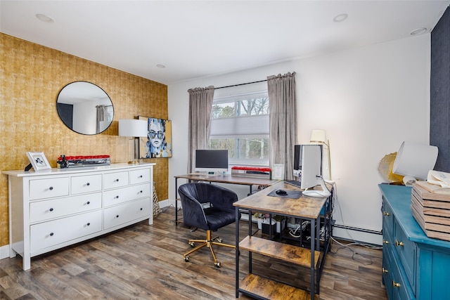 office featuring dark wood-style floors, a baseboard radiator, and baseboards