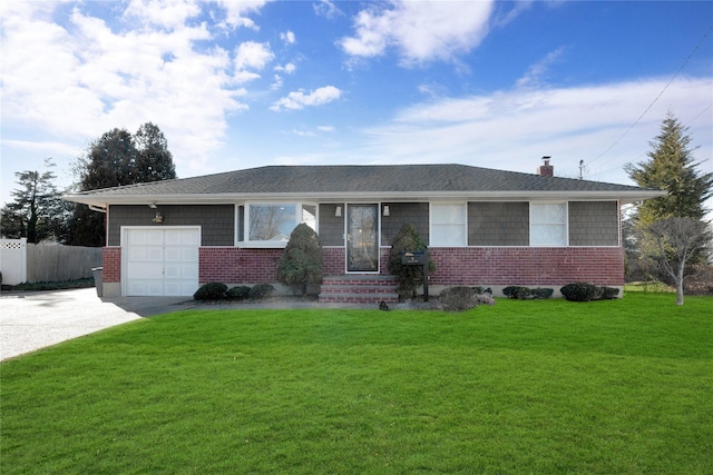 ranch-style home with a garage, driveway, a chimney, fence, and a front lawn