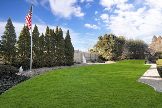 view of yard featuring fence