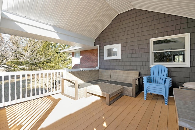 wooden deck featuring an outdoor living space